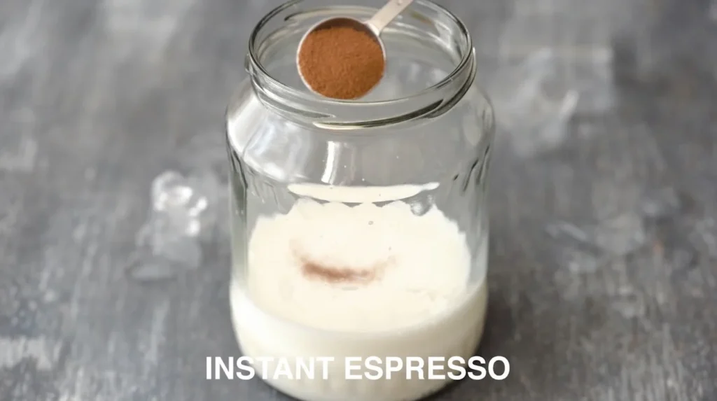 Brew instant espresso for iced caramel latte coffee